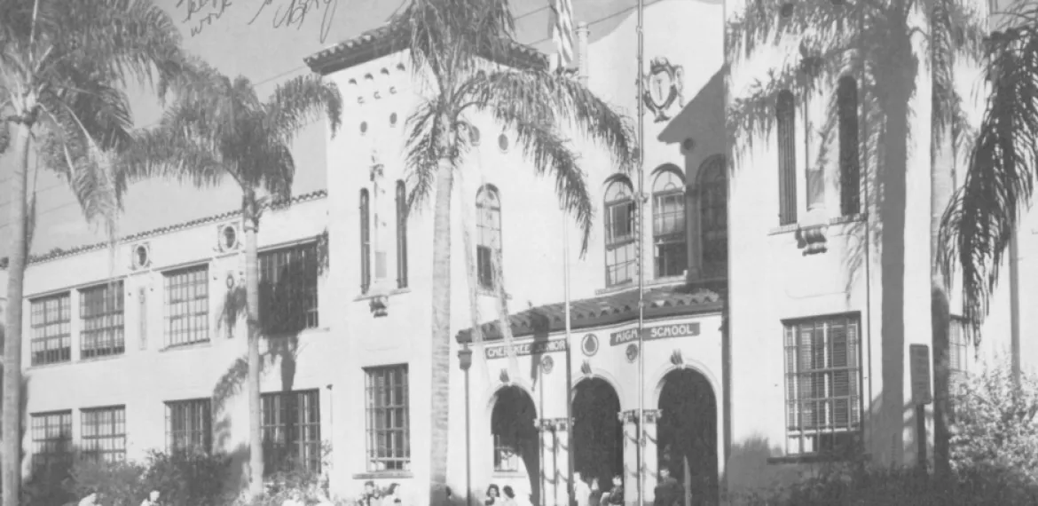 Black-and-white historic photograph of Cherokee Junior High School shortly after its 1927 opening — the symmetrical Mediterranean Revival facade with arched entryways